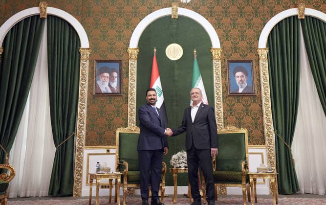 (260723) -- TEHRAN, July 23, 2026 -- Iranian President Masoud Pezeshkian (R) meets with visiting Iraqi Prime Minister Ali al-Zaidi in Tehran, Iran, on July 23, 2026. ( Handout via Xinhua) IRAN-TEHRAN-IRAQ-VISIT IraqixPrimexMinisterxMediaxOffice 