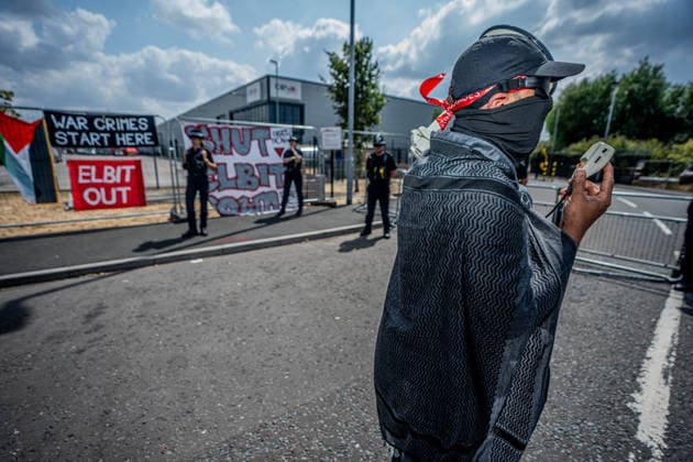 Elbit Systems Filton Bristol Pro-Palestine Protest - 23 Jul 2026 Police Officers guard the Elbit Systems factory as protesters gather during the rally. Pro-Palestinian protestors gathered outside Elbit Systems factory in Filton, Bristol to accuse the arms company of supplying Israel with weaponry and drones for its war in Gaza. Bristol United Kingdom Copyright: xLabxMox xSOPAxImagesx LabMO_Elbit_Systems_Filton_Protest_Sopa_14.jpeg