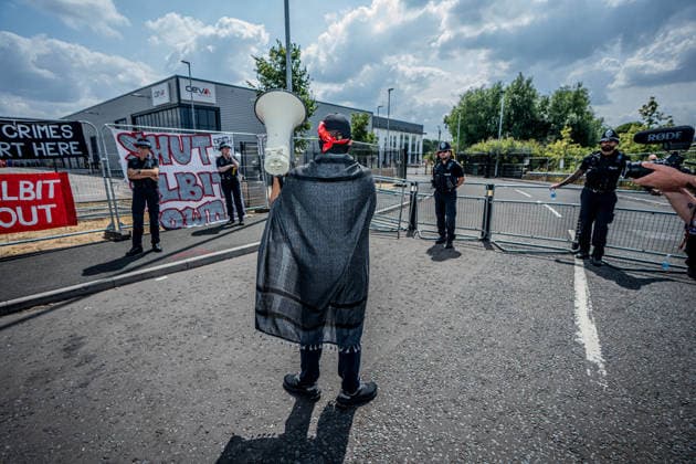 Elbit Systems Filton Bristol Pro-Palestine Protest - 23 Jul 2026 Police Officers guard the Elbit Systems factory during the rally. Pro-Palestinian protestors gathered outside Elbit Systems factory in Filton, Bristol to accuse the arms company of supplying Israel with weaponry and drones for its war in Gaza. Bristol United Kingdom Copyright: xLabxMox xSOPAxImagesx LabMO_Elbit_Systems_Filton_Protest_Sopa_3.jpeg