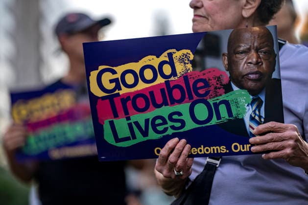 People gather to honor the late congressman John Lewis and rally for voting rights in Washington, DC on Thursday, July 23, 2026. Yesterday, the House advanced a budget blueprint that included money for state election grants aimed at promoting President Donald Trump s voting regulation bill, the SAVE America Act by encouraging states to adopt voter ID requirements.  WAP20260723313 BONNIExCASH