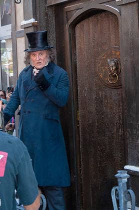 SAN DIEGO, CA - JULY 23: Johnny Depp interacts with fans at a surprise appearance as Ebenezer Scrooge promoting his new film, Ebenezer: A Christmas Carol, outside 2026 San Diego Comic Con on July 23, 2026. Copyright: xTonyxFortex