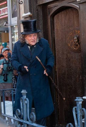SAN DIEGO, CA - JULY 23: Johnny Depp interacts with fans at a surprise appearance as Ebenezer Scrooge promoting his new film, Ebenezer: A Christmas Carol, outside 2026 San Diego Comic Con on July 23, 2026. Copyright: xTonyxFortex