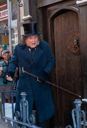 SAN DIEGO, CA - JULY 23: Johnny Depp interacts with fans at a surprise appearance as Ebenezer Scrooge promoting his new film, Ebenezer: A Christmas Carol, outside 2026 San Diego Comic Con on July 23, 2026. Copyright: xTonyxFortex