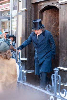 SAN DIEGO, CA - JULY 23: Johnny Depp interacts with fans at a surprise appearance as Ebenezer Scrooge promoting his new film, Ebenezer: A Christmas Carol, outside 2026 San Diego Comic Con on July 23, 2026. Copyright: xTonyxFortex