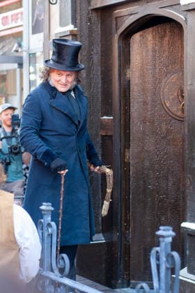 SAN DIEGO, CA - JULY 23: Johnny Depp interacts with fans at a surprise appearance as Ebenezer Scrooge promoting his new film, Ebenezer: A Christmas Carol, outside 2026 San Diego Comic Con on July 23, 2026. Copyright: xTonyxFortex