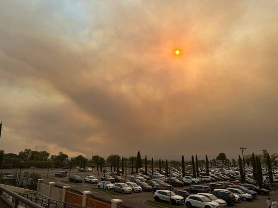 (260724) -- MADRID, July 24, 2026 -- Smoke rises from wildfires near Madrid, Spain, on July 23, 2026. Multiple wildfires burning across Spain s Madrid region on Thursday forced large-scale evacuations, with about 10,000 people affected by evacuation measures, local authorities said. (Photo by Xinhua) SPAIN-MADRID-WILDFIRES NingxYuxuan 