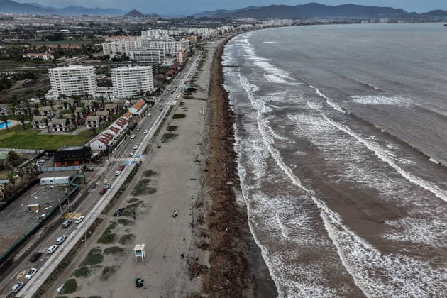 July 23, 2026, La Serena, Chile: A drone view shows La Serena Beach completely covered in trash and debris resulting from the storm that caused the river to rise. This storm affected various regions of the country, causing flooding and widespread power outages. A state of catastrophe was declared for La Serena, Chile. La Serena Chile - ZUMAu105 20260723_zip_u105_011 Copyright: xManuelxUrzuax
