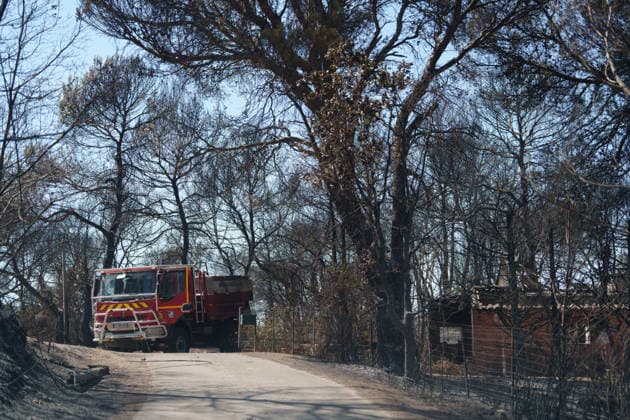 Wildfire reignites with strong Mistral wind in France. France - Cotignac, 23.07.2026 Abandoned firefighter truck from the night before as a wildfire spreads again near Cotignac in the Var department, southeastern France on Thursday. Strong Mistral winds fueled renewed fire activity, prompting a large firefighting operation. Departement Var