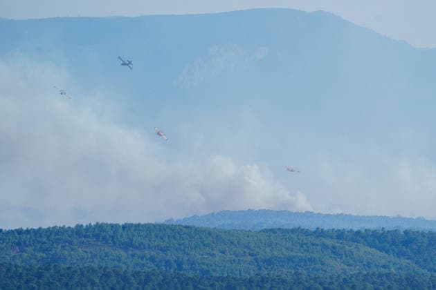 Wildfire reignites with strong Mistral wind in France. France - Cotignac, 23.07.2026 Canadair CL-415 descending toward the fire sites as a wildfire spreads again near Cotignac in the Var department, southeastern France on Thursday. Strong Mistral winds fueled renewed fire activity, prompting a large firefighting operation. Departement Var
