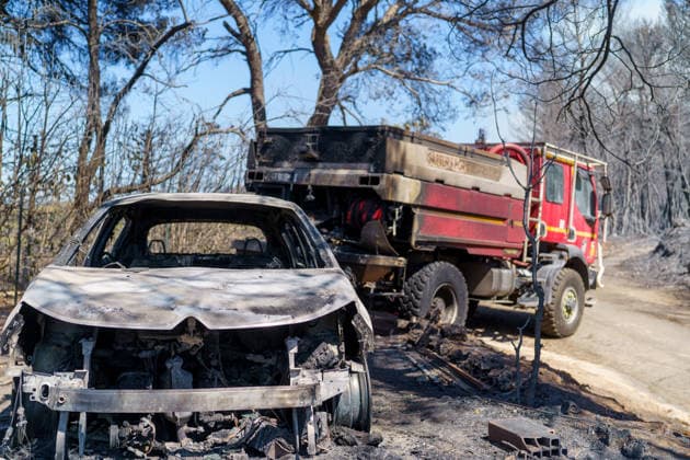Wildfire reignites with strong Mistral wind in France. France - Cotignac, 23.07.2026 Abandoned firefighter truck from the night before as a wildfire spreads again near Cotignac in the Var department, southeastern France on Thursday. Strong Mistral winds fueled renewed fire activity, prompting a large firefighting operation. Departement Var