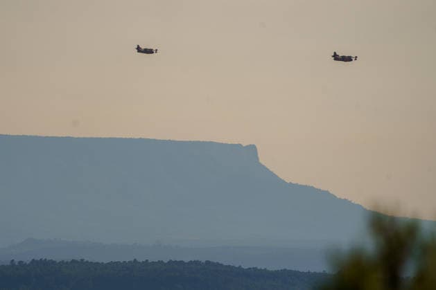 Wildfire reignites with strong Mistral wind in France. France - Cotignac, 23.07.2026 Silhouette of two Canadair CL-415 as a wildfire spreads again near Cotignac in the Var department, southeastern France on Thursday. Strong Mistral winds fueled renewed fire activity, prompting a large firefighting operation. Departement Var