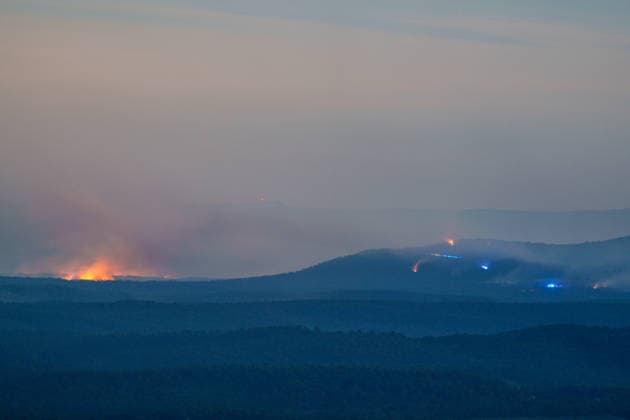 Wildfire reignites with strong Mistral wind in France. France - Cotignac, 23.07.2026 Overview at night as a wildfire spreads again near Cotignac in the Var department, southeastern France on Thursday. Strong Mistral winds fueled renewed fire activity, prompting a large firefighting operation. Departement Var