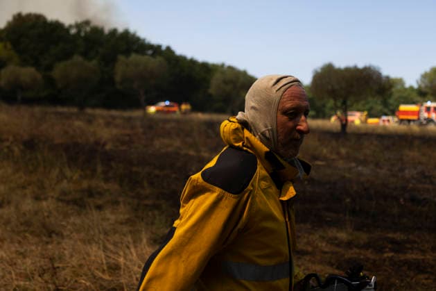 Wildfires in the Var - France A firefighter walks across burned ground after frontline operations during a wildfire at Le Domaine la Marseillaise in Ponteves, fire crews continued to monitor and secure the area after slowing the spread of the fire. Var, France, July 23, 2026. Photo by Thibaut Durand ABACAPRESS.COM. Ponteves Provence-Alpes-Cote d Azur France  Copyright: xDurandxThibaut ABACAx