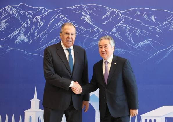 Kyrgyzstan SCO Foreign Ministers Council 9210992 24.07.2026 Russian Foreign Minister Sergey Lavrov, left, and Kyrgyz Foreign Minister Jeenbek Kulubaev shake hands as they pose for a photo before a meeting of the Shanghai Cooperation Organization (SCO) Foreign Ministers Council, in Cholpon-Ata, Kyrgyzstan. Igor Yegorov Sputnik Ð Ð˜Ð ÐÐ¾Ð²Ð¾ÑÑ‚Ð¸ Cholpon-Ata Kyrgyzstan  Copyright: xIgorxYegorovx
