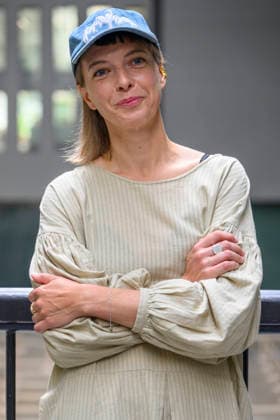 July 24, 2026, London, London, UK: Artist Lina LapelytÄ poses with her created maze-like installation, transforming the Turbine Hall into a collaborative stage. Audiences are invited to co-create in a piece of mass choreography, moving through a grid of wooden barriers. You are also free to quietly watch the performance unfold, from the Turbine Hall bridge. London, UK. London UK  - ZUMAl94_ 20260724_zaf_l94_005 Copyright: xRayxTangx