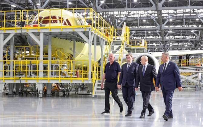 Russia Putin Siberian Federal District 9211135 24.07.2026 Russian President Vladimir Putin, accompanied by Rostec State Corporation CEO Sergei Chemezov, plant director Andrey Soinov and Irkutsk Region Governor Igor Kobzev, visits the Irkutsk Aviation Plant, a branch of Yakovlev, part of the United Aircraft Corporation (UAC) under Rostec, in Irkutsk, Russia. Evgeny Messman Sputnik Irkutsk Russia  Copyright: xEvgenyxMessmanx