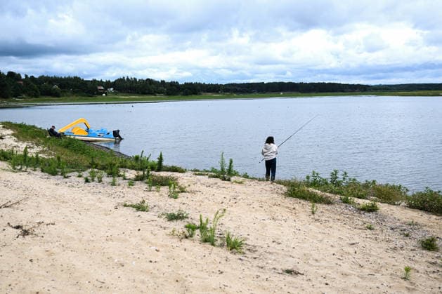 Poland s drought intensifies as climate change dries reservoirs RAKOW, POLAND - JULY 24: A woman fishes at the Chancza Reservoir, where water levels have dropped due to the ongoing drought, in Rakow, Poland, on July 24, 2026. Low water levels have been recorded at 66 percent of Poland s hydrological monitoring stations. Earlier in July, Poland s national weather agency warned that hydrological drought had spread across much of the country. Officials reported falling river levels, declining groundwater supplies, and an increasing number of monitoring stations recording flows below long-term minimum thresholds. Omar Marques Anadolu Rakow Poland. Editorial use only. Please get in touch for any other usage.  Copyright: x2026xAnadoluxOmarxMarquesx
