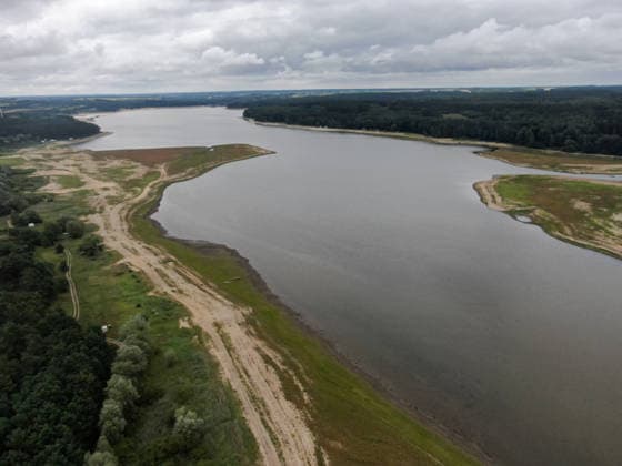 Poland s drought intensifies as climate change dries reservoirs RAKOW, POLAND - JULY 24: An aerial view of the Chancza Reservoir, showing low water levels due to the ongoing drought, in Rakow, Poland, on July 24, 2026. Low water levels have been recorded at 66 percent of Poland s hydrological monitoring stations. Warnings over worsening dry conditions were issued earlier in July, when Poland s national weather agency said hydrological drought had spread across much of the country. Officials reported falling river levels, reduced groundwater supplies, and an increasing number of monitoring stations recording flows below long-term minimum thresholds. Omar Marques Anadolu Rakow Poland. Editorial use only. Please get in touch for any other us  Copyright: x2026xAnadoluxOmarxMarquesx