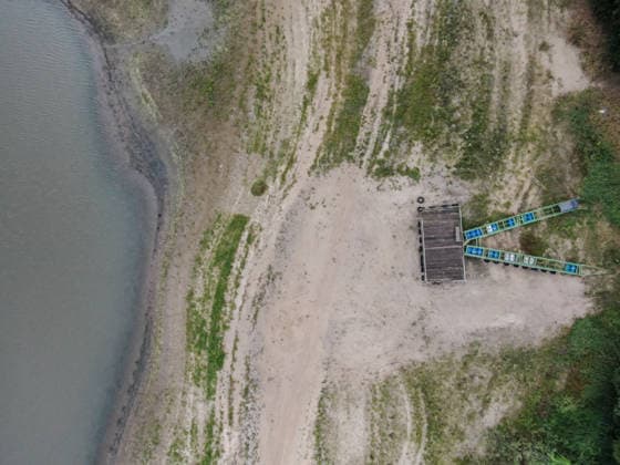 Poland s drought intensifies as climate change dries reservoirs RAKOW, POLAND - JULY 24: An aerial view of the Chancza Reservoir with low water levels due to the ongoing drought in Rakow, Poland, on July 24, 2026. Low water levels have been recorded at 66 percent of Poland s hydrological monitoring stations. Warnings over worsening dry conditions were issued earlier in July, when Poland s national weather agency said hydrological drought had spread across much of the country. Officials reported falling river levels, reduced groundwater supplies, and an increasing number of monitoring stations recording flows below long-term minimum thresholds. Omar Marques Anadolu Rakow Poland. Editorial use only. Please get in touch for any other usage.  Copyright: x2026xAnadoluxOmarxMarquesx