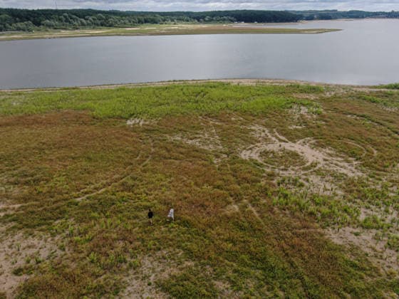Poland s drought intensifies as climate change dries reservoirs RAKOW, POLAND - JULY 24: An aerial view of the Chancza Reservoir with low water levels due to the ongoing drought in Rakow, Poland, on July 24, 2026. Low water levels have been recorded at 66 percent of Poland s hydrological monitoring stations. Warnings over worsening dry conditions were issued earlier in July, when Poland s national weather agency said hydrological drought had spread across much of the country. Officials reported falling river levels, reduced groundwater supplies, and an increasing number of monitoring stations recording flows below long-term minimum thresholds. Omar Marques Anadolu Rakow Poland. Editorial use only. Please get in touch for any other usage.  Copyright: x2026xAnadoluxOmarxMarquesx