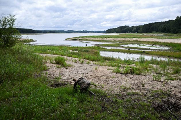 Poland s drought intensifies as climate change dries reservoirs RAKOW, POLAND - JULY 24: A view of the Chancza Reservoir with low water levels due to the ongoing drought in Rakow, Poland, on July 24, 2026. Low water levels have been recorded at 66 percent of Poland s hydrological monitoring stations. Earlier in July, Poland s national weather agency warned that hydrological drought had spread across much of the country. Officials reported falling river levels, declining groundwater supplies, and an increasing number of monitoring stations recording flows below long-term minimum thresholds. Omar Marques Anadolu Rakow Poland. Editorial use only. Please get in touch for any other usage.  Copyright: x2026xAnadoluxOmarxMarquesx