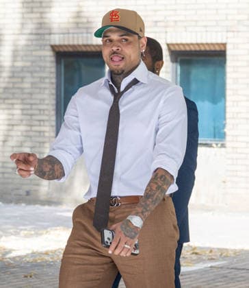 July 24, 2026, London, England, United Kingdom: R&B singer CHRIS BROWN leaves Southwark Crown Court after a case management hearing. He is charged over an alleged assault in a London nightclub. The American musician is accused of causing grievous bodily harm to Abraham Diaw in February 2023. London United Kingdom - ZUMAs262 20260724_zip_s262_001 Copyright: xTayfunxSalcix
