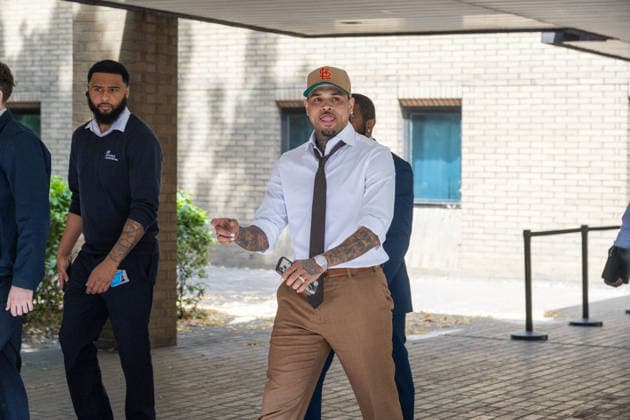 July 24, 2026, London, England, United Kingdom: R&B singer CHRIS BROWN leaves Southwark Crown Court after a case management hearing. He is charged over an alleged assault in a London nightclub. The American musician is accused of causing grievous bodily harm to Abraham Diaw in February 2023. London United Kingdom - ZUMAs262 20260724_zip_s262_006 Copyright: xTayfunxSalcix