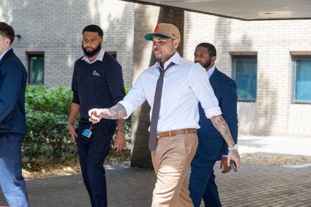July 24, 2026, London, England, United Kingdom: R&B singer CHRIS BROWN leaves Southwark Crown Court after a case management hearing. He is charged over an alleged assault in a London nightclub. The American musician is accused of causing grievous bodily harm to Abraham Diaw in February 2023. London United Kingdom - ZUMAs262 20260724_zip_s262_007 Copyright: xTayfunxSalcix