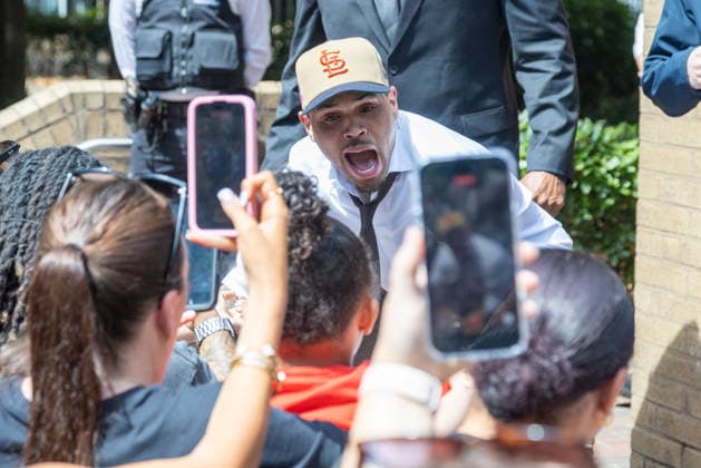 July 24, 2026, London, England, United Kingdom: R&B singer CHRIS BROWN leaves Southwark Crown Court after a case management hearing. He is charged over an alleged assault in a London nightclub. The American musician is accused of causing grievous bodily harm to Abraham Diaw in February 2023. London United Kingdom  - ZUMAs262 20260724_zip_s262_005 Copyright: xTayfunxSalcix