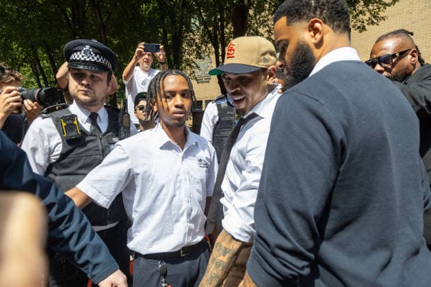 July 24, 2026, London, England, United Kingdom: R&B singer CHRIS BROWN leaves Southwark Crown Court after a case management hearing. He is charged over an alleged assault in a London nightclub. The American musician is accused of causing grievous bodily harm to Abraham Diaw in February 2023. London United Kingdom - ZUMAs262 20260724_zip_s262_014 Copyright: xTayfunxSalcix