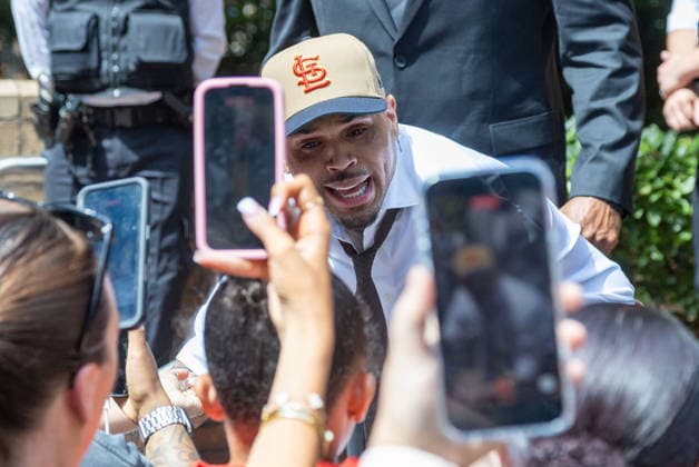 July 24, 2026, London, England, United Kingdom: R&B singer CHRIS BROWN leaves Southwark Crown Court after a case management hearing. He is charged over an alleged assault in a London nightclub. The American musician is accused of causing grievous bodily harm to Abraham Diaw in February 2023. London United Kingdom  - ZUMAs262 20260724_zip_s262_009 Copyright: xTayfunxSalcix