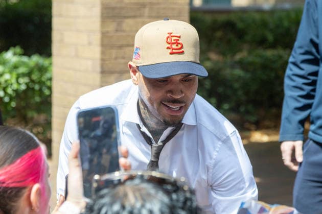 July 24, 2026, London, England, United Kingdom: R&B singer CHRIS BROWN leaves Southwark Crown Court after a case management hearing. He is charged over an alleged assault in a London nightclub. The American musician is accused of causing grievous bodily harm to Abraham Diaw in February 2023. London United Kingdom  - ZUMAs262 20260724_zip_s262_011 Copyright: xTayfunxSalcix