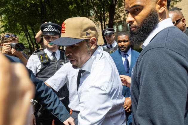 July 24, 2026, London, England, United Kingdom: R&B singer CHRIS BROWN leaves Southwark Crown Court after a case management hearing. He is charged over an alleged assault in a London nightclub. The American musician is accused of causing grievous bodily harm to Abraham Diaw in February 2023. London United Kingdom - ZUMAs262 20260724_zip_s262_016 Copyright: xTayfunxSalcix