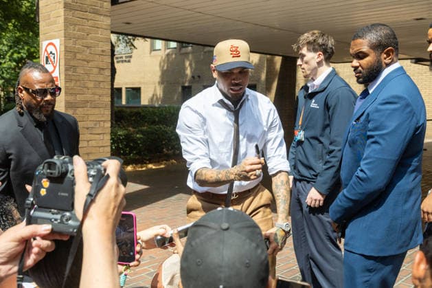 July 24, 2026, London, England, United Kingdom: R&B singer CHRIS BROWN leaves Southwark Crown Court after a case management hearing. He is charged over an alleged assault in a London nightclub. The American musician is accused of causing grievous bodily harm to Abraham Diaw in February 2023. London United Kingdom  - ZUMAs262 20260724_zip_s262_015 Copyright: xTayfunxSalcix