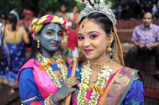 July 24, 2026: Chattogram, Bangladesh- Participants dressed as Hindu deities and mythological characters pose for portraits and interact with visitors during celebrations marking the Reverse Ratha Yatra (Ulto Ratha Yatra) festival in Chattogram, Bangladesh. The return chariot procession marks the conclusion of the nine-day Jagannath Festival, during which the deities Lord Jagannath, Balabhadra and Subhadra are ceremonially taken back to their temple. Thousands of devotees gather to take part in the annual religious celebration through prayers, rituals and cultural performances. - ZUMAr143 20260724_zap_r143_016 Copyright: xMdxRafayatxHaquexKhanx