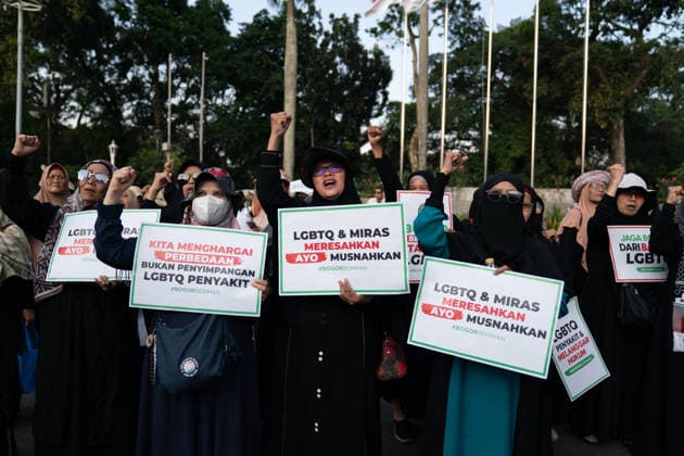 Anti-LGBT Demonstration In Indonesia A group of Muslim protesters hold with poster against the lesbian, gay, bisexual and transgender (LGBT) community in Bogor, West Java, Indonesia, on July 24, 2026. They rejected the existence of the LGBTQ community and urged the Bogor City Government to immediately enforce the Bogor City Regional Regulation on the Prevention and Handling of Deviant Sexual Behavior. 