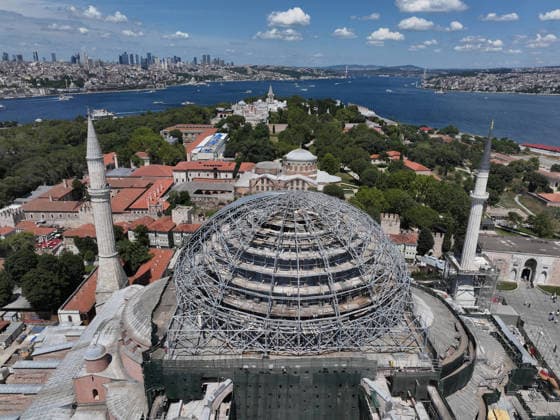 Hagia Sophia Grand Mosque enters new restoration phase ISTANBUL, TURKIYE - JULY 24: An aerial view of the Hagia Sophia Grand Mosque, as it enters a new phase in the most comprehensive conservation, restoration, and reinforcement efforts in the history of the Turkish Republic, in Istanbul, Turkiye on July 24, 2026. Work has begun to cover the temporary steel roof, erected to ensure that restoration of the main dome can proceed under safe conditions, with a protective tarp. Adem Kutucu Anadolu Istanbul Turkey. Editorial use only. Please get in touch for any other usage.  Copyright: x2026xAnadoluxAdemxKutucux