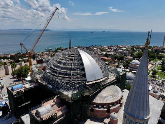 Hagia Sophia Grand Mosque enters new restoration phase ISTANBUL, TURKIYE - JULY 24: An aerial view of the Hagia Sophia Grand Mosque, as it enters a new phase in the most comprehensive conservation, restoration, and reinforcement efforts in the history of the Turkish Republic, in Istanbul, Turkiye on July 24, 2026. Work has begun to cover the temporary steel roof, erected to ensure that restoration of the main dome can proceed under safe conditions, with a protective tarp. Adem Kutucu Anadolu Istanbul Turkey. Editorial use only. Please get in touch for any other usage.  Copyright: x2026xAnadoluxAdemxKutucux