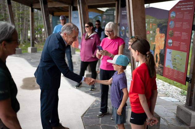 July 24, 2026, Gros Morne National Park, Nl, CANADA: Prime Minister Mark Carney greets visitors during a walk around the visitor centre grounds during a visit to Gros Morne National Park, N.L., Friday, July 24, 2026. Gros Morne National Park CANADA  - ZUMAc35_ 20260724_zaf_c35_015 Copyright: xJessicaxStapletonx