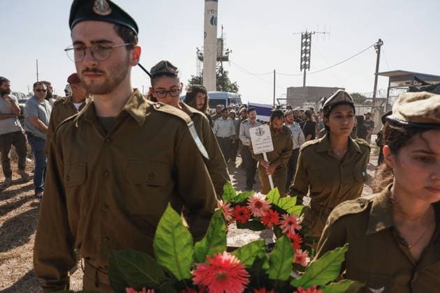 Thousands Attend Funeral of Benayahu Melet, Killed Defending Hikers Near Havat Gilad HAVAT GILAD, WEST BANK JULY 24, 2026: Thousands gathered to pay their final respects and lay to rest Benayahu Melet, a member of the Havat Gilad civilian alert squad and the community s agriculture director. Melet, 32, was killed earlier that day after rushing to assist a group of Israeli hikers who had been attacked near the community. During the incident, a Palestinian assailant seized his weapon and shot him dead. He is survived by his wife, Esther, and their two daughters, Tair Eretz and Adama Ivriya. Following his death, Melet was recognized as a fallen IDF soldier and given a military burial. A second Israeli, IDF Major Yuval Ezra, 27, was also ki Copyright: x xHilelxbenxorx xJNAxPressx