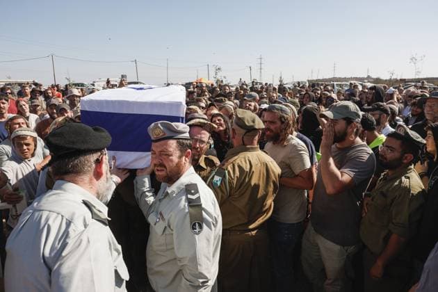 Thousands Attend Funeral of Benayahu Melet, Killed Defending Hikers Near Havat Gilad HAVAT GILAD, WEST BANK JULY 24, 2026: Thousands gathered to pay their final respects and lay to rest Benayahu Melet, a member of the Havat Gilad civilian alert squad and the community s agriculture director. Melet, 32, was killed earlier that day after rushing to assist a group of Israeli hikers who had been attacked near the community. During the incident, a Palestinian assailant seized his weapon and shot him dead. He is survived by his wife, Esther, and their two daughters, Tair Eretz and Adama Ivriya. Following his death, Melet was recognized as a fallen IDF soldier and given a military burial. A second Israeli, IDF Major Yuval Ezra, 27, was also ki Copyright: x xHilelxbenxorx xJNAxPressx