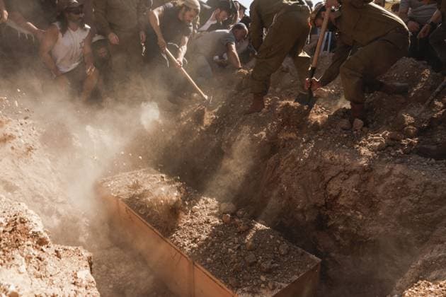 Thousands Attend Funeral of Benayahu Melet, Killed Defending Hikers Near Havat Gilad HAVAT GILAD, WEST BANK JULY 24, 2026: Thousands gathered to pay their final respects and lay to rest Benayahu Melet, a member of the Havat Gilad civilian alert squad and the community s agriculture director. Melet, 32, was killed earlier that day after rushing to assist a group of Israeli hikers who had been attacked near the community. During the incident, a Palestinian assailant seized his weapon and shot him dead. He is survived by his wife, Esther, and their two daughters, Tair Eretz and Adama Ivriya. Following his death, Melet was recognized as a fallen IDF soldier and given a military burial. A second Israeli, IDF Major Yuval Ezra, 27, was also ki Copyright: x xHilelxbenxorx xJNAxPressx