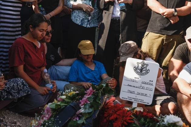 Thousands Attend Funeral of Benayahu Melet, Killed Defending Hikers Near Havat Gilad HAVAT GILAD, WEST BANK JULY 24, 2026: Thousands gathered to pay their final respects and lay to rest Benayahu Melet, a member of the Havat Gilad civilian alert squad and the community s agriculture director. Melet, 32, was killed earlier that day after rushing to assist a group of Israeli hikers who had been attacked near the community. During the incident, a Palestinian assailant seized his weapon and shot him dead. He is survived by his wife, Esther, and their two daughters, Tair Eretz and Adama Ivriya. Following his death, Melet was recognized as a fallen IDF soldier and given a military burial. A second Israeli, IDF Major Yuval Ezra, 27, was also ki Copyright: x xHilelxbenxorx xJNAxPressx