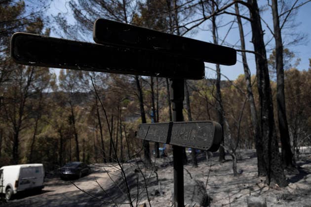 Wildfires in the Var - Cotignac - France Burned directional signs stand amid a forest devastated by a major wildfire near Cotignac, the scorched vegetation and damaged infrastructure illustrate the impact of the fire on the surrounding landscape. Var, France, July 24, 2026. Photo by Thibaut Durand ABACAPRESS.COM. Cotignac Provence-Alpes-Cote d Azur France  Copyright: xDurandxThibaut ABACAx