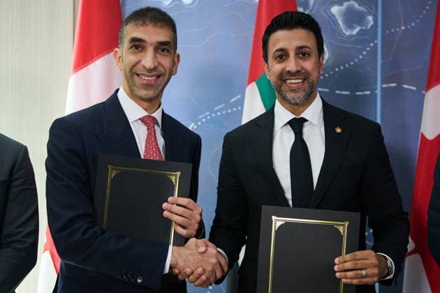 July 24, 2026, Toronto, On, Canada: United Arab Emirates Minister of Foreign Trade Dr. Thani bin Ahmed Al Zeyoudi, left, and Canada s Minister of International Trade Maninder Sidhu shake hands after signing a joint agreement at a press conference in Toronto, on Friday, July 24, 2026. Toronto Canada  - ZUMAc35_ 20260724_zaf_c35_045 Copyright: xSammyxKoganx
