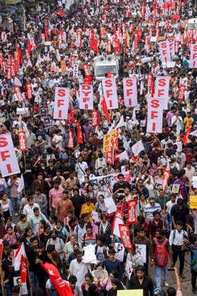 Kolkata Rally Supports CJP Protest A dense crowd carrying student organization banners and placards advances through a city street in Kolkata, India, on July 24, 2026. The rally was held in solidarity with the Cockroach Janta Party s ongoing protest at New Delhi s Jantar Mantar demanding the resignation of Education Minister Dharmendra Pradhan over alleged NEET examination irregularities, as leaders of the youth-led movement held a second round of talks with government officials after Prime Minister Narendra Modi pledged legal reforms and swift punishment for those involved in exam paper leaks. Kolkata West Bengal India Copyright: xDebajyotixChakrabortyx