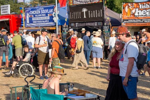 July 25, 2026, Corsham, Wiltshire, England: Festival goers enjoy a sunny Friday at WOMAD Festival in Wiltshire. Corsham England  - ZUMAr169 20260725_zip_r169_019 Copyright: xRodxHarbinsonx