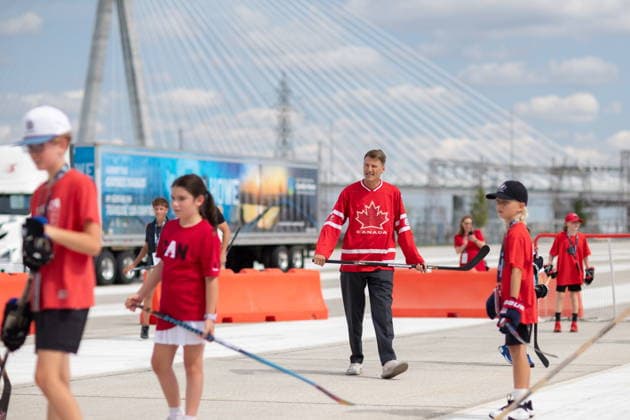 July 24, 2026, Windsor, On, CANADA: Minister of Housing and Infrastructure Gregor Robertson, centre, plays ball hockey at a ribbon cutting ceremony for the opening of the Gordie Howe International Bridge, in Windsor, Ont., Friday, July 24, 2026. Windsor CANADA  - ZUMAc35_ 20260724_zaf_c35_096 Copyright: xDaxxMelmerx