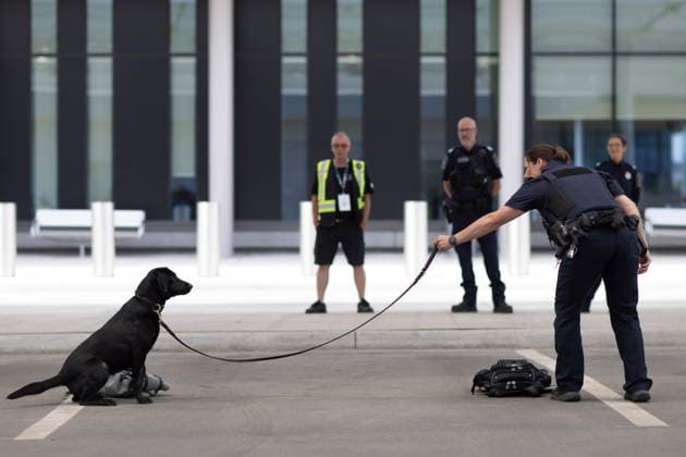 July 24, 2026, Windsor, On, CANADA: Adele St. Denis, a Canada Border Services agent, handles Younique, a K-9 unit dog, during a tour of the CBSA facilities at the Gordie Howe International Bridge, in Windsor, Ont., Friday, July 24, 2026. Windsor CANADA  - ZUMAc35_ 20260724_zaf_c35_100 Copyright: xDaxxMelmerx