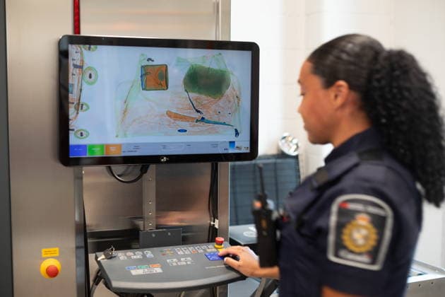 July 24, 2026, Windsor, On, CANADA: A Canada Border Services agent works an X-ray machine during a tour of the facilities at the Gordie Howe International Bridge, in Windsor, Ont., Friday, July 24, 2026. Windsor CANADA  - ZUMAc35_ 20260724_zaf_c35_105 Copyright: xDaxxMelmerx